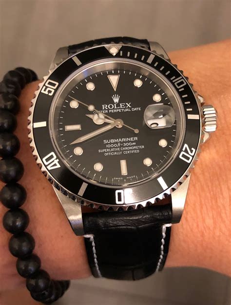 rolex leather|Rolex with black leather band.